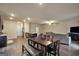Open-concept view showcasing the dining area, kitchen, and living room with modern finishes at 157 Oliver Dr, Locust Grove, GA 30248