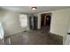 Bright dining area with tile floors, large window, and stainless steel refrigerator at 1093 Grace Sw St, Mableton, GA 30126