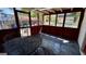Relaxing screened porch with outdoor seating and views of the backyard at 1093 Grace Sw St, Mableton, GA 30126