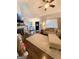 Bright living room with fireplace, lots of light and hardwood floors for a cozy and inviting space at 110 S Fairfield Dr, Peachtree City, GA 30269