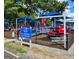 Fun all- playground with colorful play structures and shade canopies for outdoor enjoyment at 110 S Fairfield Dr, Peachtree City, GA 30269