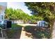 Backyard with deck, mature trees, and storage shed at 2554 Willenhall Way, Lithonia, GA 30058