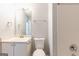 Bathroom with a vanity, toilet, and a mirror at 2554 Willenhall Way, Lithonia, GA 30058