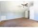 Bedroom featuring neutral walls, carpeted floors, and a ceiling fan at 2554 Willenhall Way, Lithonia, GA 30058