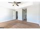 Spacious bedroom featuring carpeted floors, neutral walls, and a ceiling fan at 2554 Willenhall Way, Lithonia, GA 30058