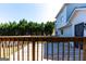 Back deck featuring wood railings, perfect for outdoor relaxation and entertaining at 2554 Willenhall Way, Lithonia, GA 30058