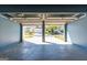 Garage with an open door showcasing the neighborhood view at 2554 Willenhall Way, Lithonia, GA 30058