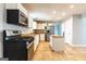 A well-equipped kitchen has granite countertops and stainless steel appliances at 2554 Willenhall Way, Lithonia, GA 30058