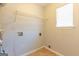 Utility room with tile floors and closet for storage at 2554 Willenhall Way, Lithonia, GA 30058