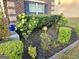 Front yard landscaping with roses, mulch and manicured bushes at 1166 Vienna Ct, Hampton, GA 30228