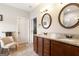 Elegant bathroom with double vanities, granite countertops, and stylish fixtures for a luxurious feel at 155 Lawrence Dr, Villa Rica, GA 30180