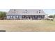 This two-story home with a front porch, shutters, and dormers at 155 Lawrence Dr, Villa Rica, GA 30180