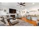 Cozy living room with hardwood floors, a fireplace, and comfortable seating area at 155 Lawrence Dr, Villa Rica, GA 30180