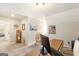 Comfortable home office featuring a wood desk, neutral walls, and carpeted flooring at 155 Lawrence Dr, Villa Rica, GA 30180