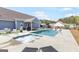 Sparkling pool and jacuzzi offer an oasis for relaxation and entertaining in the backyard at 155 Lawrence Dr, Villa Rica, GA 30180
