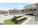 Outdoor pool area featuring patio furniture, an umbrella, a dining table and more at 155 Lawrence Dr, Villa Rica, GA 30180