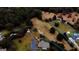 Expansive land parcel featuring rolling hills, mature trees, and multiple structures on a picturesque landscape at 5300 Salem Rd, Covington, GA 30016