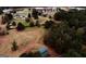 Aerial view of barn and surrounding land with multiple homes and buildings in distance at 5300 Salem Rd, Covington, GA 30016