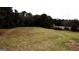 Large lot with trees and green grass at 5300 Salem Rd, Covington, GA 30016