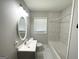 This bathroom features updated fixtures, shower and vanity at 3456 Glensford Dr, Decatur, GA 30032