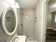 A full bathroom with updated vanity, shower, mirror and fresh paint at 3456 Glensford Dr, Decatur, GA 30032
