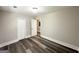 This bedroom features modern flooring, fresh paint, and a spacious closet at 3456 Glensford Dr, Decatur, GA 30032