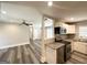 Modern kitchen featuring stainless steel appliances, granite countertops, and bar to the living room at 3456 Glensford Dr, Decatur, GA 30032