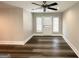 Inviting living room space with wood floors, modern ceiling fan, and bright lighting at 3456 Glensford Dr, Decatur, GA 30032