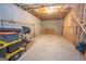 Spacious unfinished basement with exposed ceiling and ample room for storage or future projects at 115 W Wind Ct, Tyrone, GA 30290