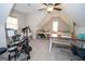 Spacious upstairs bedroom featuring a drum set, play area, and ample natural light at 115 W Wind Ct, Tyrone, GA 30290