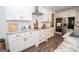 Bright kitchen features stainless appliances, subway tile backsplash and quartz counters at 115 W Wind Ct, Tyrone, GA 30290