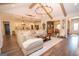 Expansive living space showcases an open layout connecting the living room, dining area, and kitchen at 115 W Wind Ct, Tyrone, GA 30290