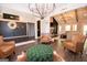 Bright and airy living area with stylish furnishings, hardwood floors, and an open layout at 115 W Wind Ct, Tyrone, GA 30290