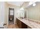 This bathroom has decorative wallpaper and a unique countertop and vanity at 324 County Line Rd, Fayetteville, GA 30215