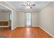 Bright dining room features hardwood floors, neutral walls, and a window offering natural light at 324 County Line Rd, Fayetteville, GA 30215