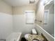 Bathroom featuring a granite countertop and tiled shower-tub combo at 2155 Meador Se Ave, Atlanta, GA 30315