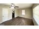 Spacious living room featuring sleek flooring, neutral walls, and a ceiling fan at 2155 Meador Se Ave, Atlanta, GA 30315