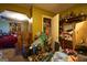 Untidy bedroom cluttered with personal items, boxes and clothing creating a messy and unorganized space at 24 Shiloh Church Rd, Carrollton, GA 30116
