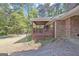 Side view of the house showing the spacious deck and outdoor living space at 9155 Lakeview Sw Dr, Covington, GA 30014