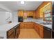Kitchen with white countertops and wooden cabinetry at 9155 Lakeview Sw Dr, Covington, GA 30014