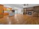 Inviting living room with hardwood floors, a cozy fireplace, and natural light at 9155 Lakeview Sw Dr, Covington, GA 30014