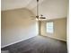 Large bedroom with vaulted ceilings, neutral walls, and cozy carpet flooring at 825 Rapid Ct, Mcdonough, GA 30252
