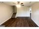 Bright living room with modern wood flooring and stairs leading to the second floor at 825 Rapid Ct, Mcdonough, GA 30252