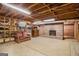 Unfinished basement with exposed beams, a brick fireplace, carpeted floors and room to customize at 215 North Mourning Dove N Dr, Fayetteville, GA 30215