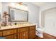 Bathroom featuring a modern vanity, an updated bathtub with white subway tiles, and wood-look flooring at 215 North Mourning Dove N Dr, Fayetteville, GA 30215