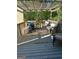 Relaxing deck with outdoor seating, grill, and ample space for entertaining guests at 220 Camerons Way, Covington, GA 30016