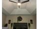 Bedroom with ceiling fan, tray ceilings, and decorated in neutral colors at 220 Camerons Way, Covington, GA 30016