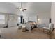 The main bedroom features a vaulted ceiling, neutral carpet, and bright, white furniture at 1011 Austin Rd, Ellenwood, GA 30294