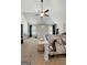The main bedroom features a vaulted ceiling, neutral carpet, and bright, white furniture at 1011 Austin Rd, Ellenwood, GA 30294