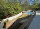 Inviting backyard pool and deck area, perfect for entertaining and relaxing outdoors at 4430 Kings Hwy, Douglasville, GA 30135